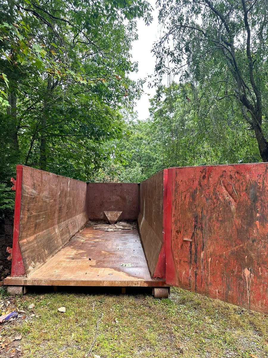 Roll-off dumpster placed on residential driveway