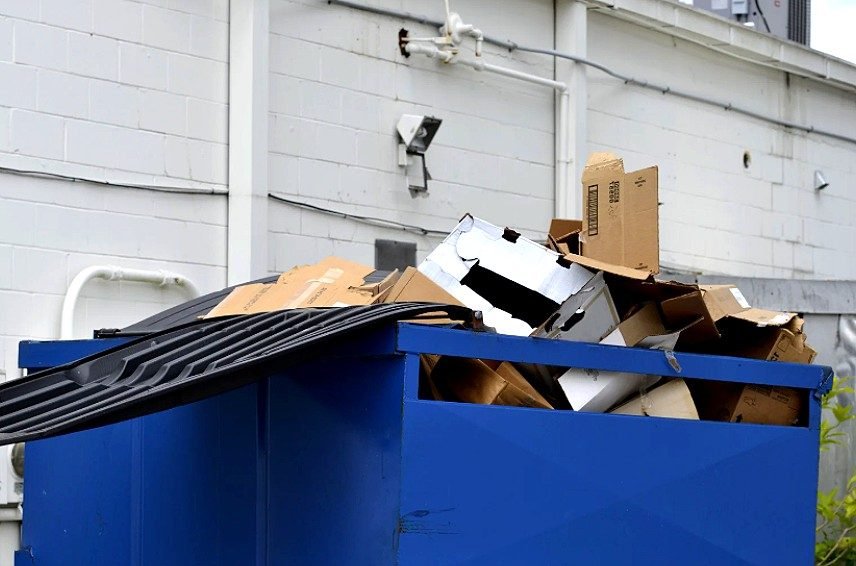 Walk-in barn doors open for loading debris