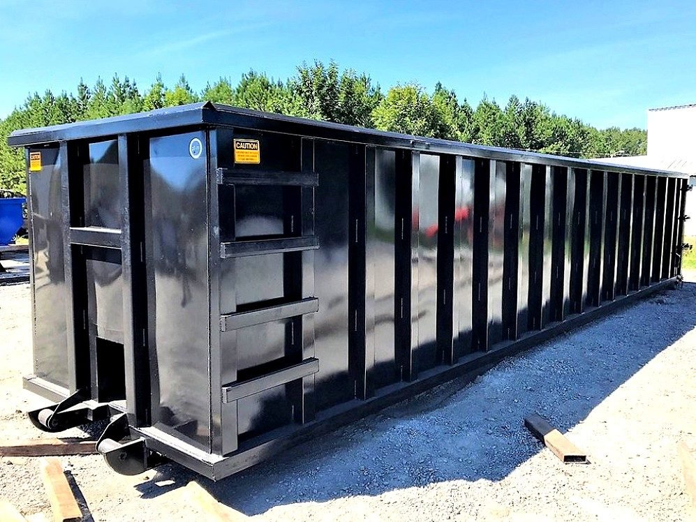 Heartland Prairie Waste & Roll-Off Services heavy construction dumpster on job site in Wichita